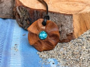 Collier pendentif bois et perle soleil